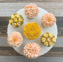 Load image into Gallery viewer, Peach, Golden Yellow, and White Flower Cupcakes
