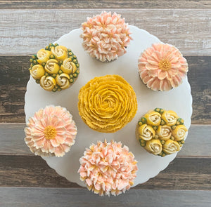 Peach, Golden Yellow, and White Flower Cupcakes